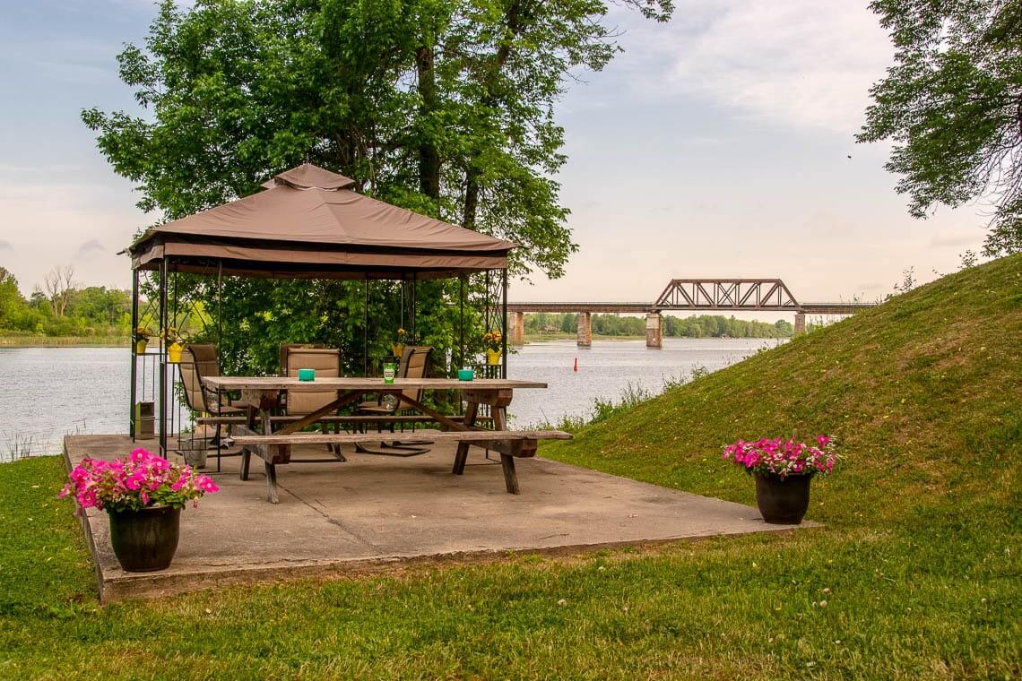 Gazebo and sitting area by the river.